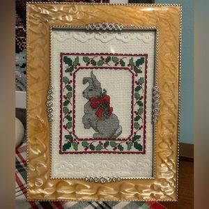 Vintage cross stitched bunny rabbit and Holly Christmas art in rhinestone frame